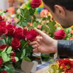 Man buying roses